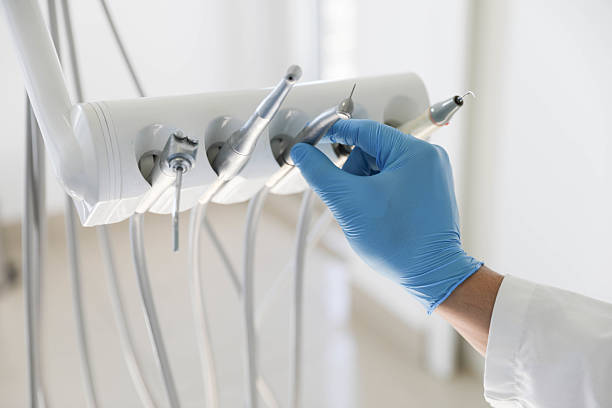 Professional Tooth Extraction technician working in Schlusser, PA